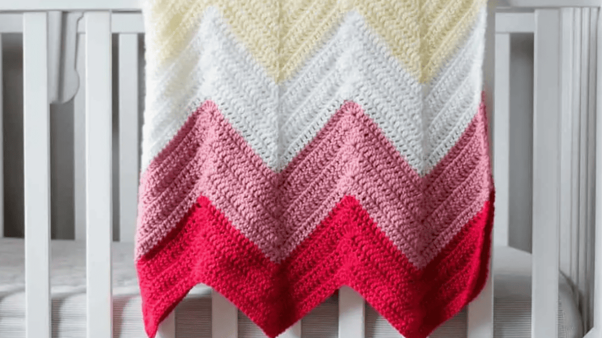 Pinks and white blanket made from our Free Crochet Blanket Patterns