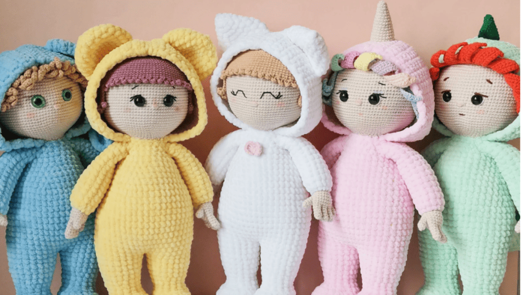 these crochet baby doll patterns are for 5 dolls that look like old cabbage patch dolls