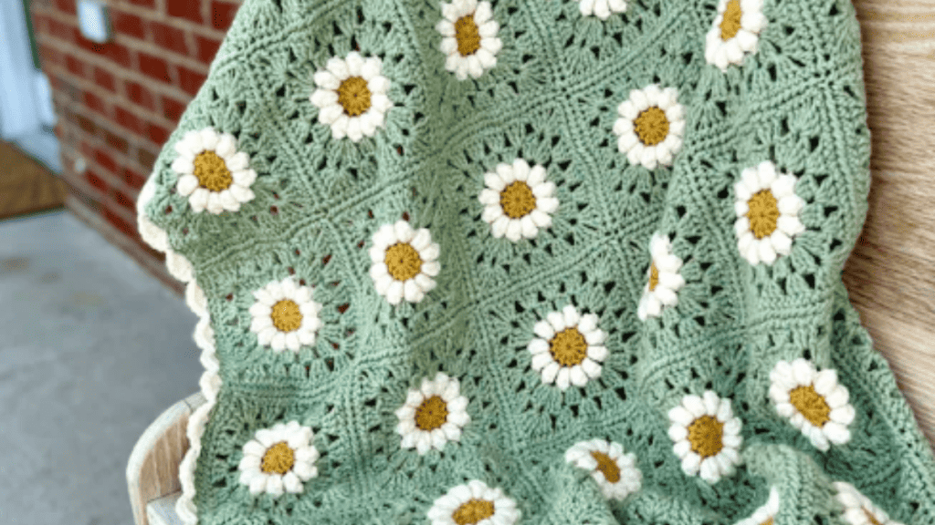 green Crochet Daisy Granny Squares made into a blanket