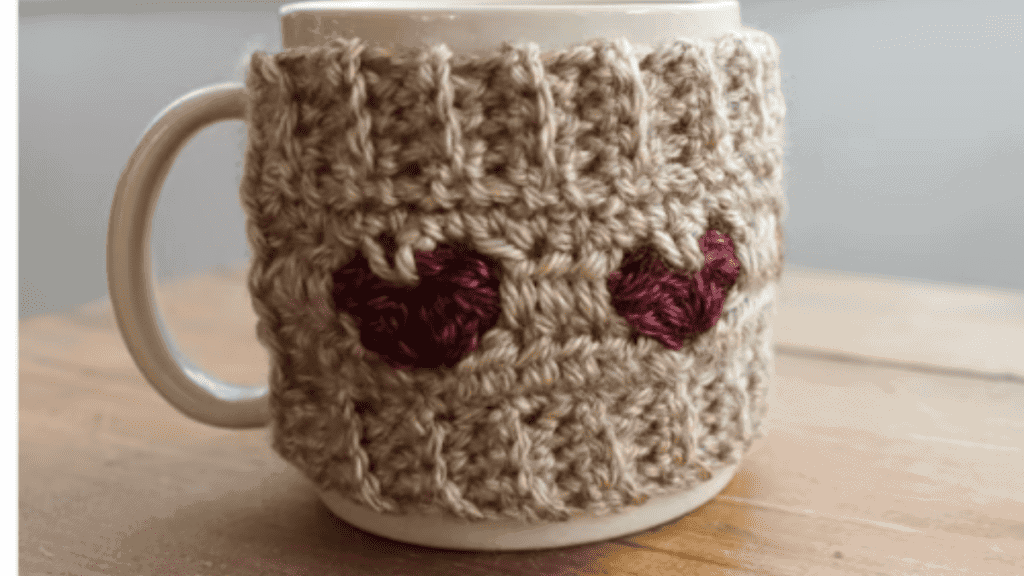 This image has an empty alt attribute; its file name is CROCHET-MUG-COZY-1024x576.png