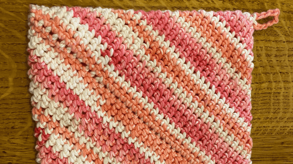 pink, white and orange double thick crochet potholder pattern finished