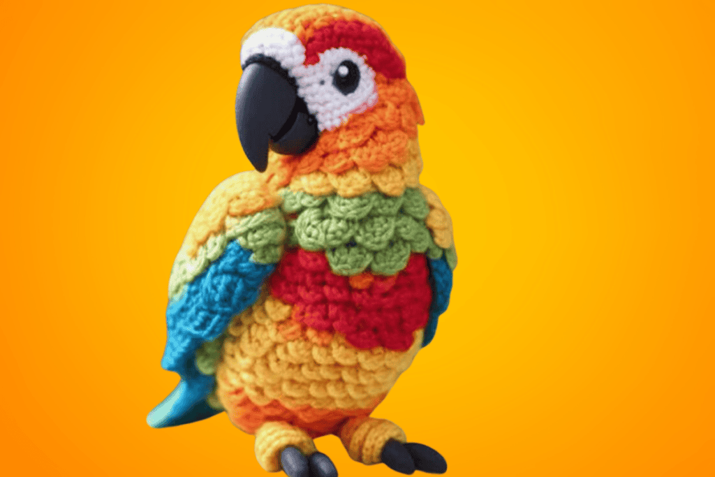crocheted parrot with multiple colors