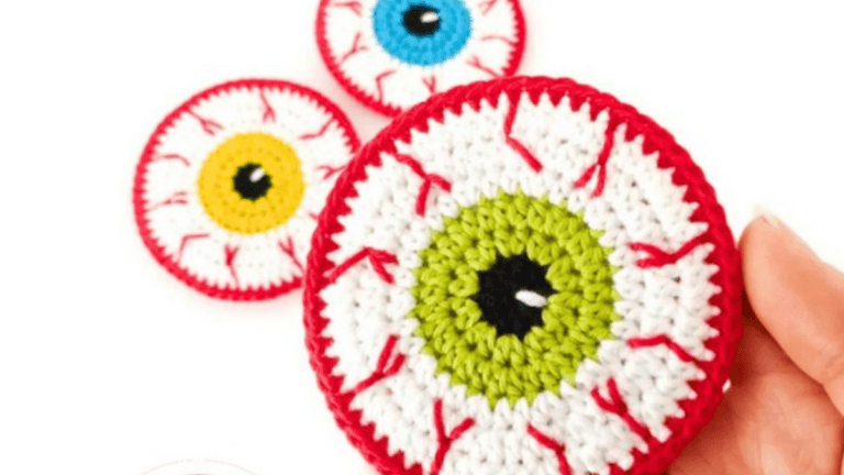 monster coasters with eyeballs in the middle