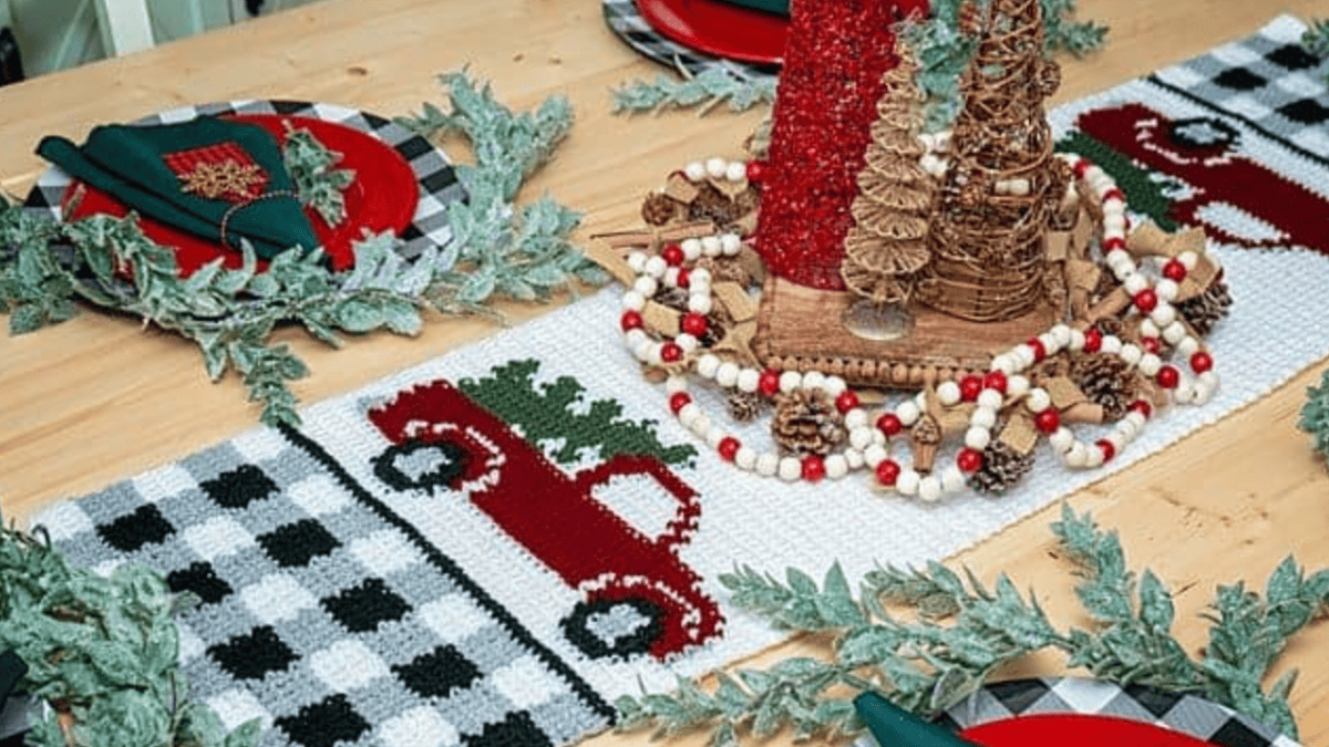 red truck on cream table runner