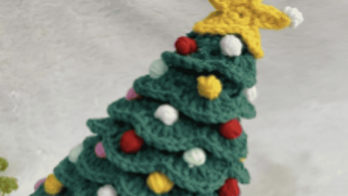 christmas tree with a yellow star and ornaments