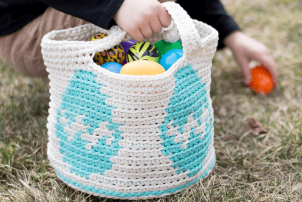 White basket with blue Easter eggs