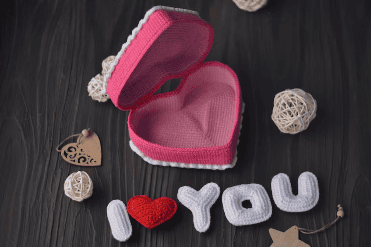 Heart-shaped crochet box that says I love you